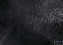 استوک فوتیج گرد و غبار Dust Particles Against Black